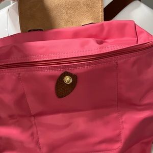 Longchamp Paris small backpack.